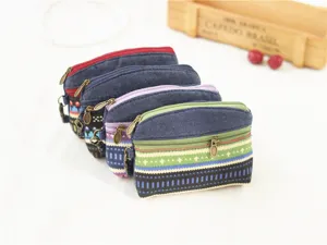 Ethnic style denim coin purse with double zipper, compact vintage fabric pouch for keys and cards.