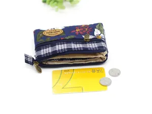 Floral pattern multi-layer cotton coin purse detail view, showing exquisite fabric and zippers.