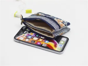Multi-layer floral canvas coin purse detail, portable fabric zipper wallet for women.