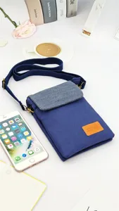 Blue canvas crossbody phone bag with adjustable strap, mini casual shoulder bag for women.