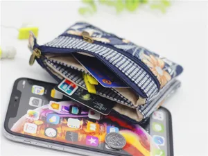 Multi-layer cotton fabric coin purse with floral pattern, compact zipper wallet for women.