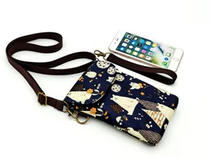 Waterproof cross-body cell phone bag with cute animal print and adjustable brown strap