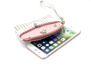 Fabric coin purse with double zippers, floral pattern and wrist strap for daily use.