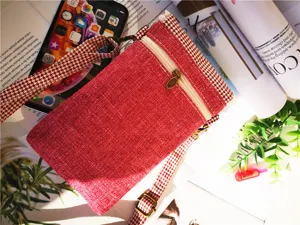 Red cotton linen crossbody phone bag with houndstooth strap, ideal for daily casual use.
