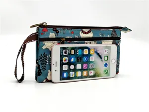Sac pochette multicouche en toile bleue avec de jolis imprimés d'animaux de dessin animé et dragonne.