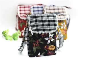 Floral cotton fabric crossbody phone bag with multi-layer storage and plaid flap design.