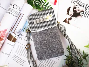 Grey houndstooth fabric crossbody phone bag with lace trim and elegant flower detail.