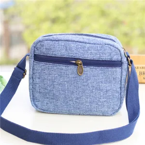 Klassische blaue Leinen-Canvas-Umhängetasche mit Fronttasche und verstellbarem Schultergurt