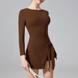 Detailed view of long sleeve athletic tennis dress, activewear romper with shorts.