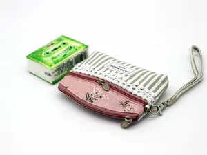 Fabric coin purse with strap, double zipper pocket, green stripe and floral design.