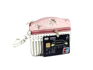 Floral fabric coin purse with card slot double zipper and wrist strap for women daily use.