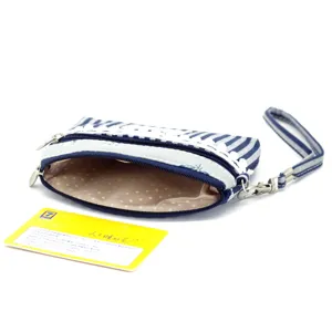 Blue and white striped fabric coin purse with double zippers and wrist strap for women.
