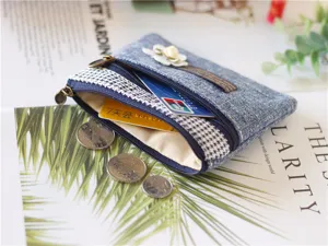 Denim coin purse multi-layer fabric wallet with card slots and cute flower detail for women.
