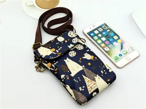 Detailed view of dark blue cute bear pattern crossbody phone bag with brown strap for daily.