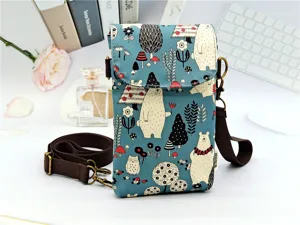 Cute cartoon bear print crossbody phone bag detail showing waterproof laminated fabric.