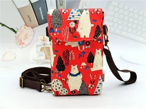 Red waterproof laminated crossbody phone bag with cute bear print, multi-layer women handbag.
