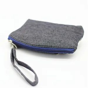 Dark denim coin purse with blue zipper and wrist strap, compact zipper pouch for daily use.