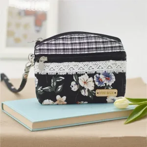 Floral patchwork coin purse with lace trim and wooden handmade tag detail for daily carry