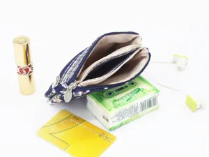Details of multi-layer floral fabric coin purse, showing interior compartments and size.