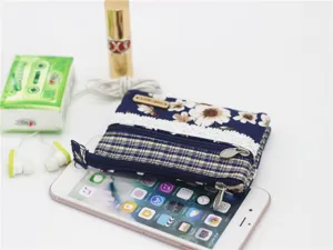 Multi-layer floral cotton coin purse fabric pouch with lace trim and double zippers.