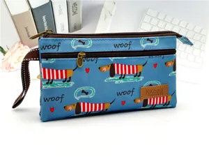 Sac pochette multicouche en toile imprime teckel de dessin anime bleu avec dragonne pour femmes.