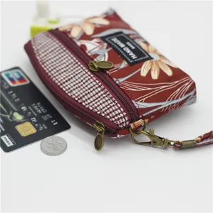 Vintage floral fabric coin purse with double zippers, wrist strap and handy handmade pocket style.