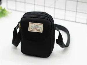 Borsa a tracolla in nylon nero vista dettagliata, piccola borsa con zip e cinturino.