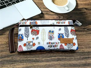 Trousse à crayons en toile avec motif hibou mignon et pochette zippée multicouche.