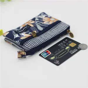 Multi-layer floral cotton coin purse with zipper closure, compact card holder pouch for women.