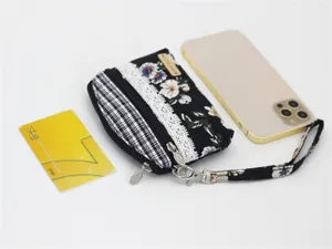 Floral fabric coin purse with wrist strap double zipper small wallet for women daily use.