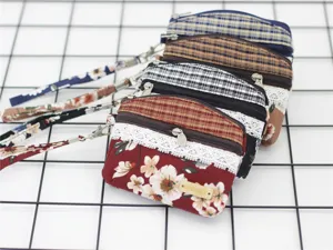 Korean style floral double zip coin purse with wrist strap and lace trim, portable storage bag.