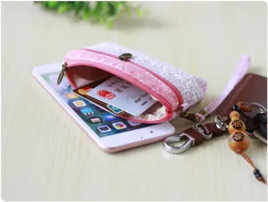 Pink floral lace coin purse double zipper mini wallet with keychain strap detail view.