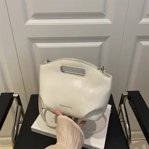 Minimalist white glossy women underarm shoulder bag, stylish casual crossbody purse for daily wear.