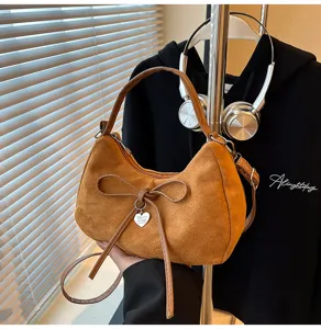 Effenkleur strik schoudertas, stijlvolle commuter crossbody tas met suède textuur.