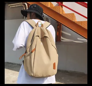 Casual canvas backpack for daily commuting, lightweight student school bag in khaki.