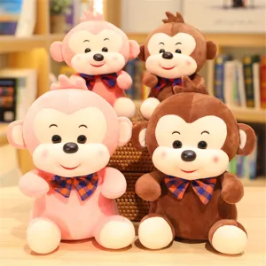 Cute plush monkey toy with plaid bowtie, soft stuffed animal doll for kids and gifts.