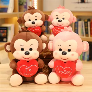 Cute plush monkey stuffed animal toy holding love heart soft doll gift for kids wholesale
