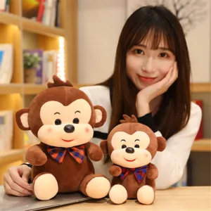 Cute brown plush monkey toy with plaid bowtie soft stuffed animal doll for kids gift.