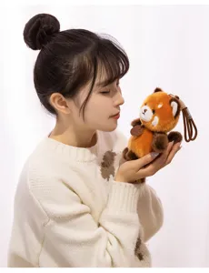 Adorable red panda plush toy bag charm, soft stuffed animal keychain pendant accessory.