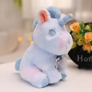 Cute pastel blue plush unicorn toy with soft fabric and sweet bow tie for kids gift.