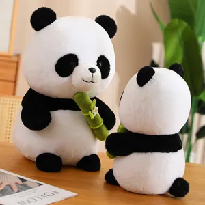 Cute panda plush toy holding bamboo, soft stuffed animal doll for kids, adorable gift and toy.