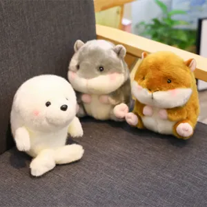 Cute round hamster and seal plush toys detail shot, soft stuffed animal doll for kids gift.