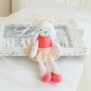 Cute rabbit plush toy detail, soft stuffed bunny doll with ballet dress and pink shoes.