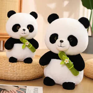 Cute panda plush toy holding bamboo with flower, soft stuffed animal doll for kids gift.