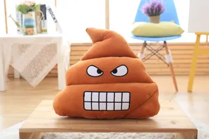 Funny poop plush pillow detail showing embroidered angry expression and soft fabric material.