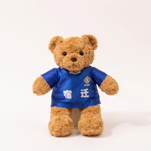Cute plush teddy bear toy wearing a blue soccer jersey, perfect fan gift and souvenir.