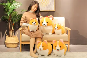 Detail view of cute chubby corgi plush toys displayed on a cozy sofa, soft and huggable stuffed dogs.