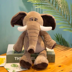Cute plush elephant toy soft stuffed animal doll for kids gift and home room decor details.