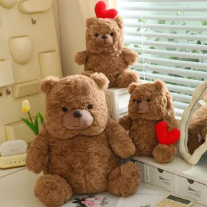 Cute brown teddy bear plush toy with red heart, soft stuffed animal doll gift for girls and kids.
