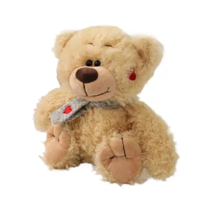 Cute plush teddy bear toy with scarf and heart, soft stuffed animal gift for girls and kids.